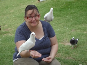 I was at the Iron Pagoda Park and stopped to feed the pigeons...yes rats with wings are climbing on me